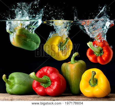 Splash Water From Water Droping Bell Pepper.