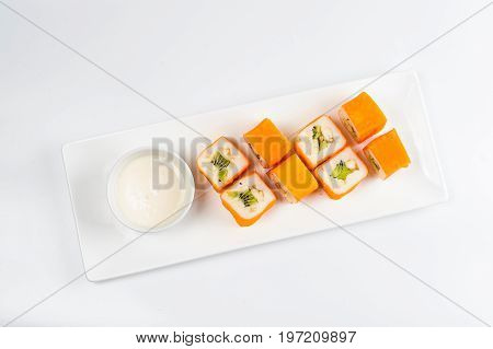 Dessert Maki Sushi - Roll With Various Fruit In Rice Pudding And Coconut Flakes