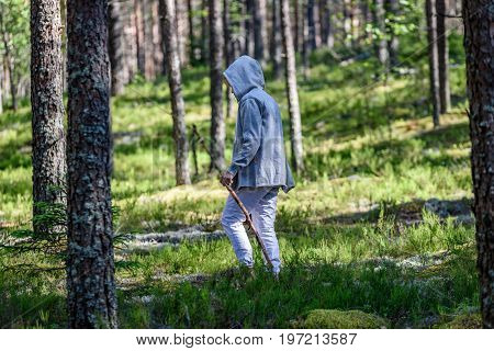 Young Woman Enjoying Nature In Forest