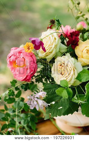 wedding, floral design, applied art, decoration, summer concept - fresh bunch of beautiful blossoms: tender avalanches, english roses, big blooming peony and red dianthuses