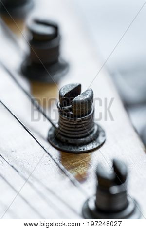 closeup of vintage electric guitar tuners. Selective focus