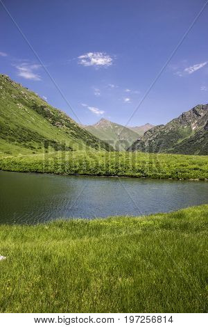Lake valley of Dzitaku in the mountains of the Caucasian range, Krasnaya Polyana, Sochi, Russia