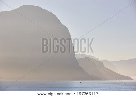 Norwegian fjord landscape sunrise. Fisherman solitude. Horizontal