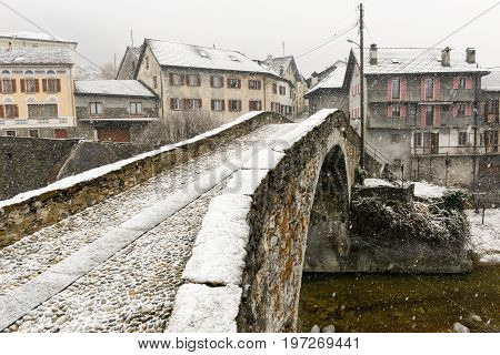 Roman Bridge At Giornico Onder Snow On Leventina Valley