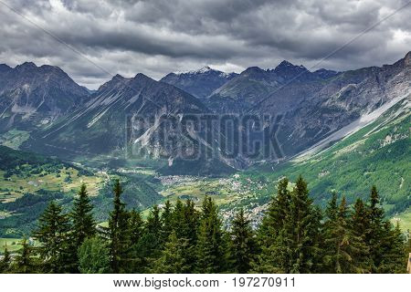 Top view of Bormio city and alps rocks