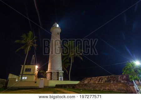 Beautiful night view with lighthouse in old colonial fort Galle in Sri Lanka