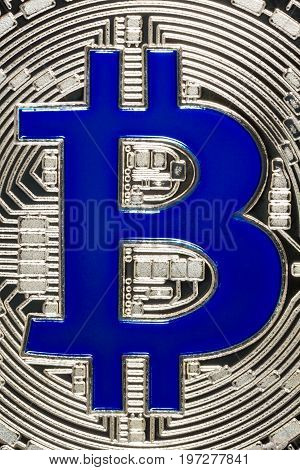 Bit-coin item on grey background. High resolution photo.