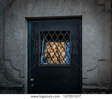 The Old Vintage Door In A Stone Wall