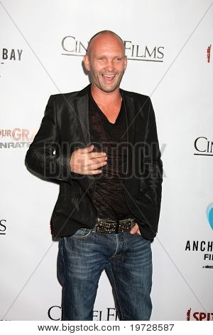 LOS ANGELES - SEP 29: Andrew Howard arriva a 