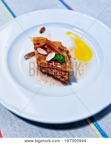 Turkish Baklava Dessert On White Plate