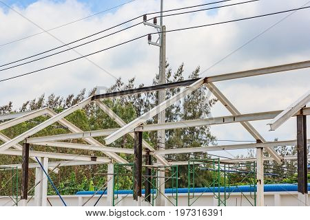 steel and iron roof structure of under construction site building