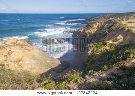 Beach And Cliffs In Vila Nova De Milfontes
