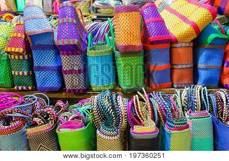 Colorful baskets for sale in a market in Oaxaca Mexico