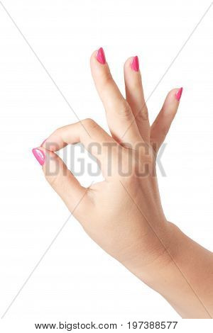 Woman Hand in OK Sign on a white background