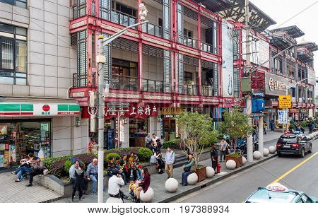 Shanghai, China - Nov 6, 2016: Fangbang Middle Road - Commercial buildings reflect Old Shanghai mood. Image also features people along the street.