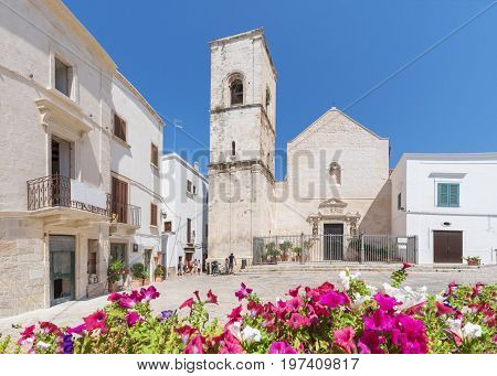 Central square and Matriarchal Church (Chiesa Matrice) in Polignano a Mare Apulia Italy