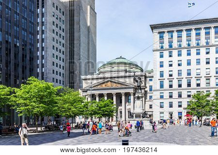 Montreal, Canada - May 28, 2017: Old Town Area With People Crossing Place D'arms Square During Morni