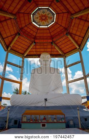 Buddha statue in Sri Sarananda Maha Pirivena complex ancient city Anuradhapura Sri Lanka
