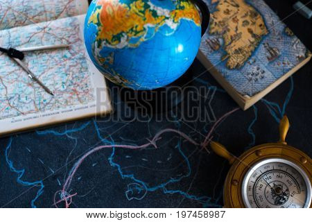 Globe on a black matte background with lights