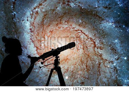 Girl Looking At The Stars With Telescope. Pinwheel Galaxy Messier 101, M101 In The Constellation Urs