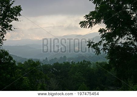 Early morning fog rises from the Blue Ridge Mountains near Bryson City, NC
