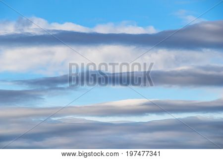 pattern formed by stratocumulus clouds adorn an early evening blue sky