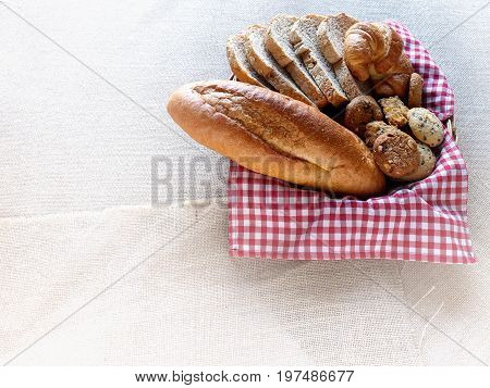 Fresh bread in the basket. Food background.