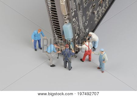 Computer Repairs Concept With Mini Figures And Components