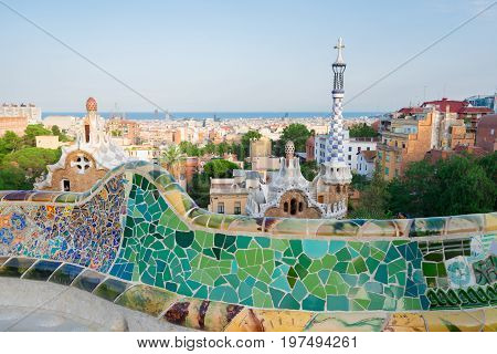 Gaudi bench and cityscape of Barcelona from park Guell, famous view of Barcelona, Spain