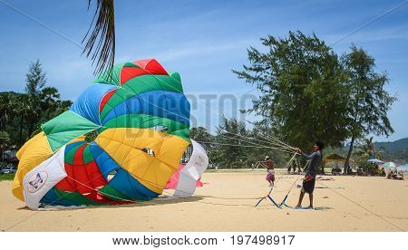 Playing Parasailing In Phuket, Thailand