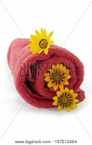 Red Towel Rolled Up With 3 Gazanias