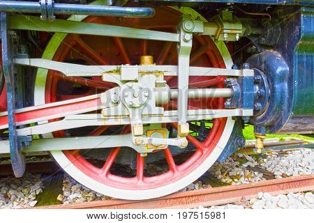 The Grunge old steam locomotive wheel and rods