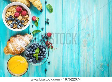 Multigrain wholewheat healthy cereals with fresh berry for breakfast. Top view and copyspace