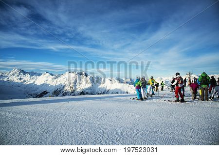 Panorama of the Austrian ski resort Ischgl with skiers.