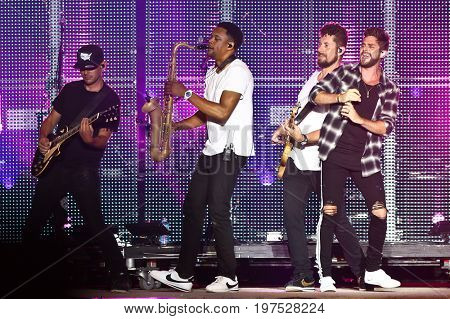 TWIN LAKES, WI-JUL 22: (L-R) Nathan Whitney, Frank Houston, Travis Vance and Thomas Rhett perform at Country Thunder Music Festival on July 22, 2017 in Twin Lakes, Wisconsin.
