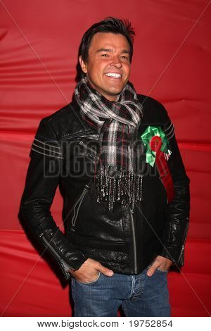 LOS ANGELES - NOV 28:  Michel Maloney arrives at the 2010 Hollywood Christmas Parade at Hollywood Boulevard on November 28, 2010 in Los Angeles, CA