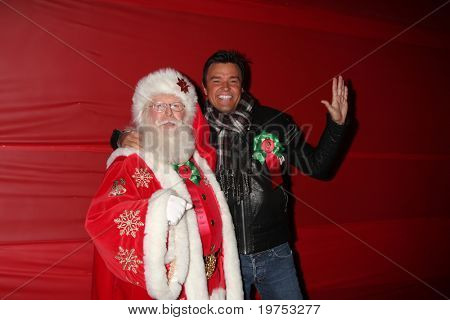 LOS ANGELES - NOV 28:  Tom Connaghan - as Santa Claus, Michael Maloney arrive at the 2010 Hollywood Christmas Parade at Hollywood Boulevard on November 28, 2010 in Los Angeles, CA