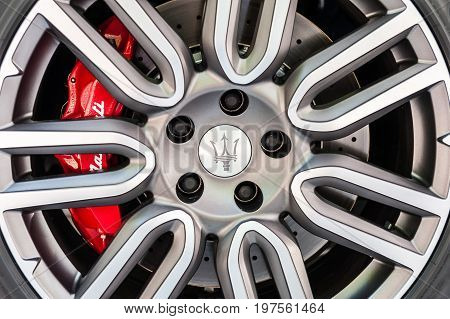 TORINO - JUN 08 2017: Showroom. Close up of a Maserati wheel and brake system