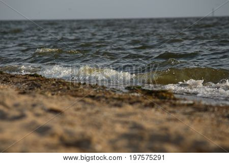 Wave rolling on the sandy shore of the Black Sea, Southern Ukraine