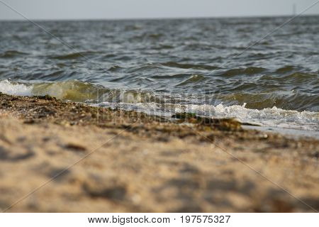 Wave rolling on the sandy shore of the Black Sea, Southern Ukraine