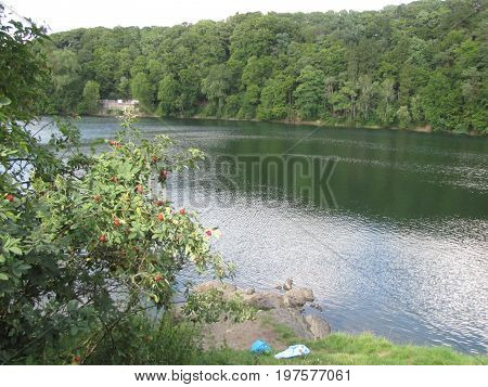 A lake in Olmen, a village in the European countryside