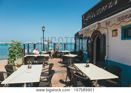 Coralejo, Fuerteventura Island, Spain - April 03, 2017: Street View Of Corralejo With Bars And Resta