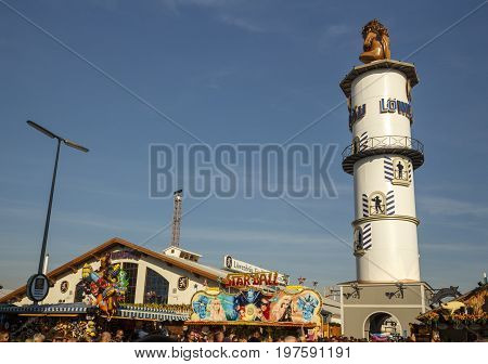 Munich, Germany - September 24, 2016: Facade and entrance of the Loewenbraeu beer tent with people standing in front