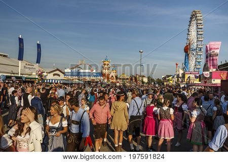 Munich, Germany - September 24, 2016: Main street on Theresienwiese fairground with large beer tents and sales stalls