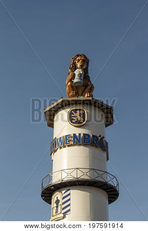 Munich, Germany - September 24, 2016: Famous tower of the Loewenbraeu beer tent with the lion sculpture on top