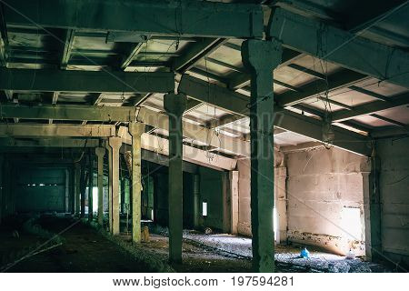 Abandoned factory, warehouse, dark building interior, Apocalypse concept, toned