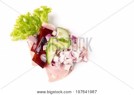 Danish specialties and national dishes high-quality open sandwich. Sandwich with pork roll sausage rullepoelse jelly and raw red onions isolated on white background