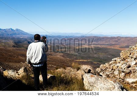Man Standing And Admiring The Swartberg Mountains