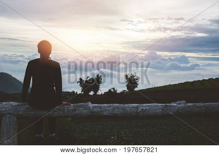 Asian women travel sleep relax. Morning atmosphere nature Forests mountains. Phu Thap Buek Thailand