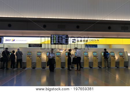 TOKYO JAPAN - JULY 11, 2017: Unidentified people check in at Skymark Airline counter.